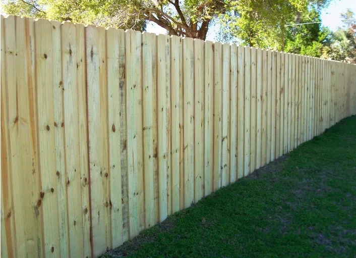 Wood privacy fence installation